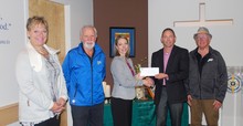 STAR Catholic Board Chair Thalia Hibbs (centre) accepts a donation for the Division from the Alberta Summer Games Legacy Committee, presented by committee members (left to right) Donna Tona, John Bole, Darrell Huber and Eugene Miller.