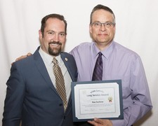 Vice Chair John Tomkinson honours 20 Year Long Service honouree Ray Suchow
